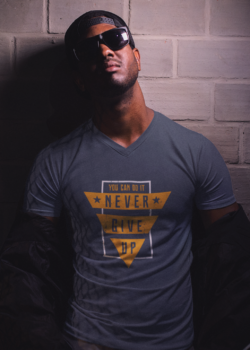 v-neck-t-shirt-mockup-of-a-black-man-against-a-wall-wearing-sunglasses-a12157